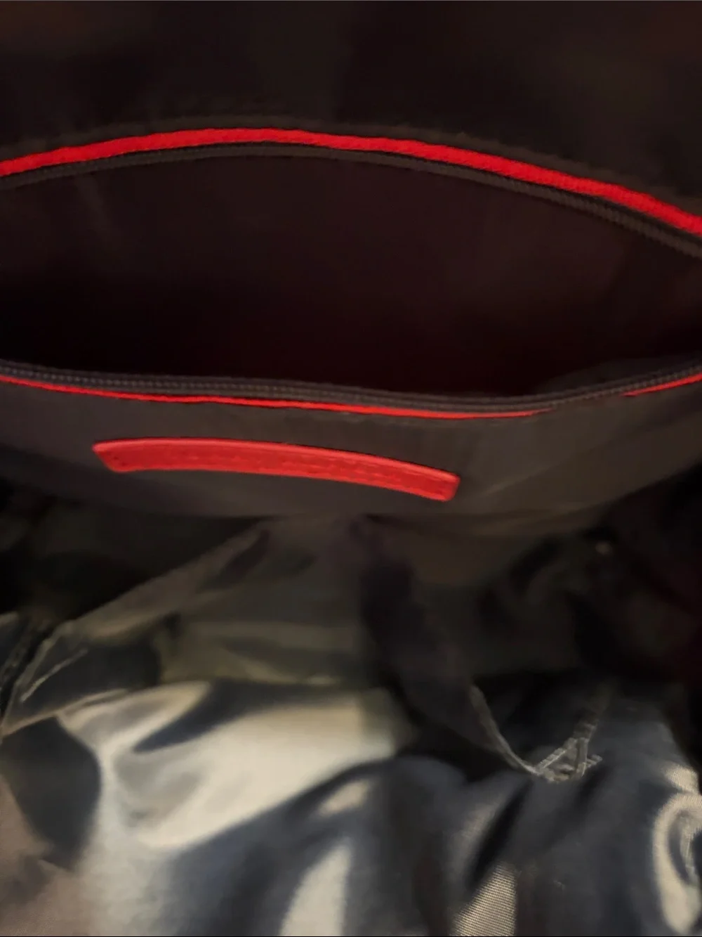 Tommy Hilfiger Red and White Monogram Backpack with Tan Trim.